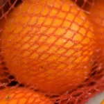 Lady pours hot glue over branches. This Christmas DIY has the internet stunned